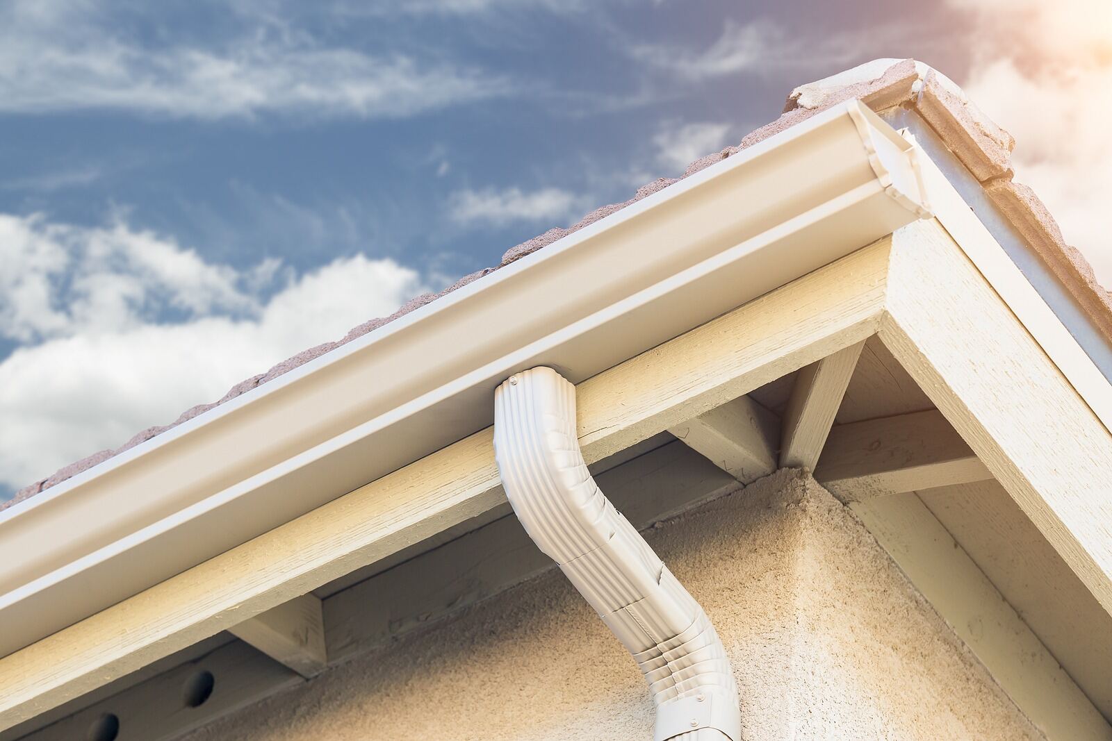 House with a new seamless aluminum gutter system installed